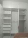 Наповнення шафи з тремпелем та шухлядами на замовлення розпашної білої в дитячу кімнату під стелю