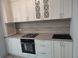 Кухня фарбована RAL 9016 біла з фрезуванням. Стільниця та пристінна панель Дуб скельний 1316-12 фото 4
