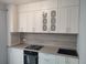 Кухня фарбована RAL 9016 біла з фрезуванням. Стільниця та пристінна панель Дуб скельний 1316-12 фото 9